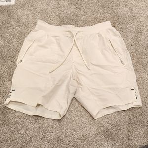 License to Train Linerless Short 7", size Medium, Color Lemon Sorbet.